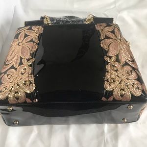 Elegant Black and Gold Shoulder Bag